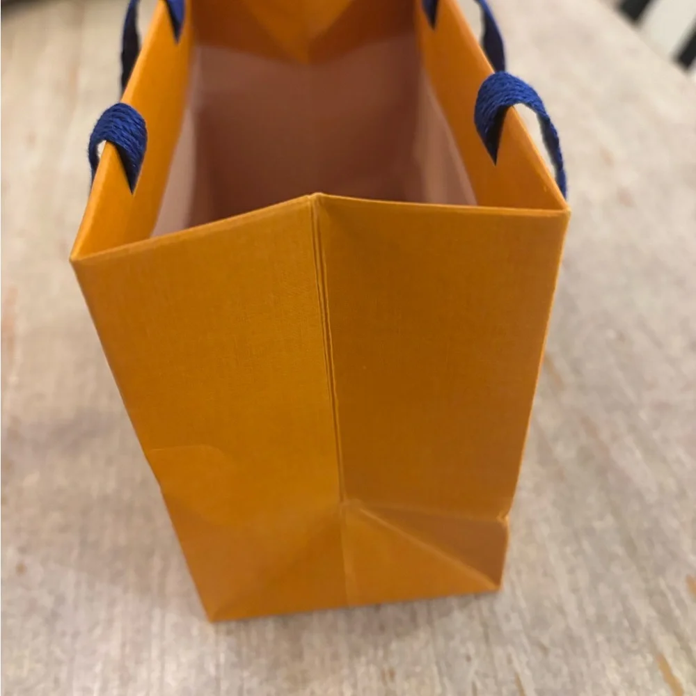 Louis Vuitton Vibrant Orange Bag with Blue Handles